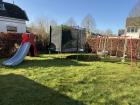 Schommel, trampoline en glijbaan